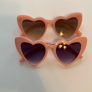 2 pairs of pink heart sunglasses